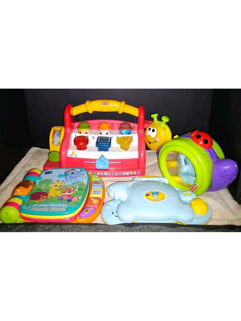 Large lot of 4 interactive baby and toddler learning toys VTech and Fisher-Price